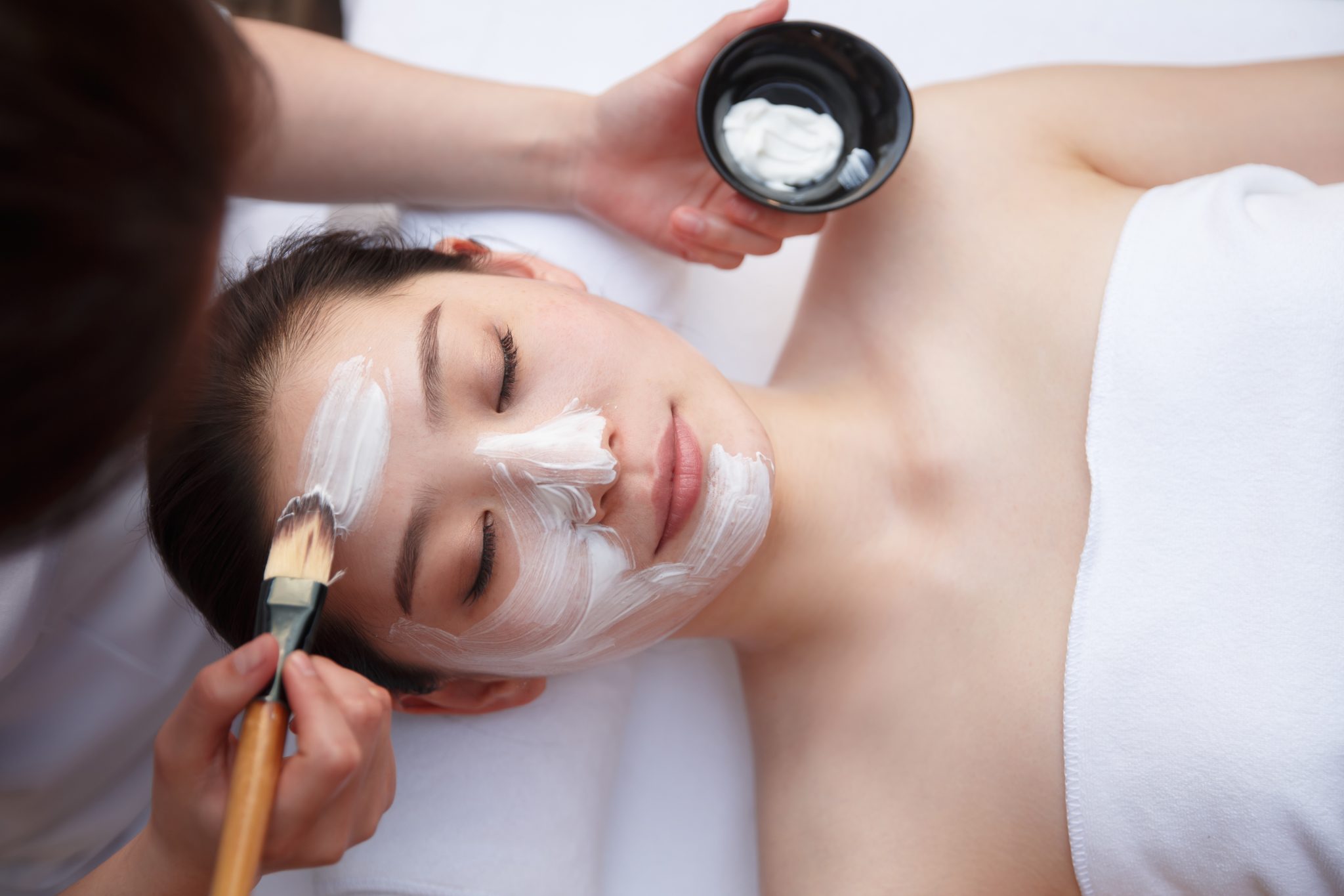 Hydrating facial treatment with golden mask at Manhattan NYC spa